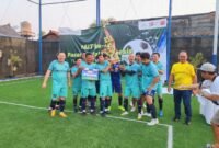 Foto : Tim Mini Soccer PROPAMI Merayakan Kemenangan Gemilang dalam Final Turnamen HUT Ke-46 Pasar Modal Indonesia. (Doc. PROPAMI)