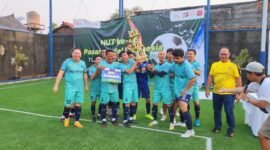 Foto : Tim Mini Soccer PROPAMI Merayakan Kemenangan Gemilang dalam Final Turnamen HUT Ke-46 Pasar Modal Indonesia. (Doc. PROPAMI)